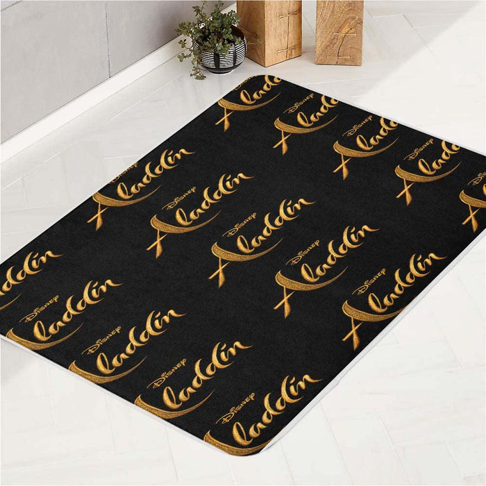 aladdin disney golden logo font bath rugs