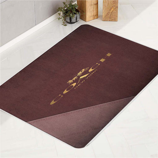 Coach Comfort Grip bath rugs