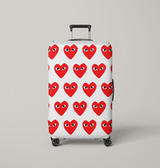 comme des garcons play red logo Luggage Cover | suitcase