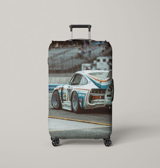 classic car racing in arena Luggage Covers | Suitcase