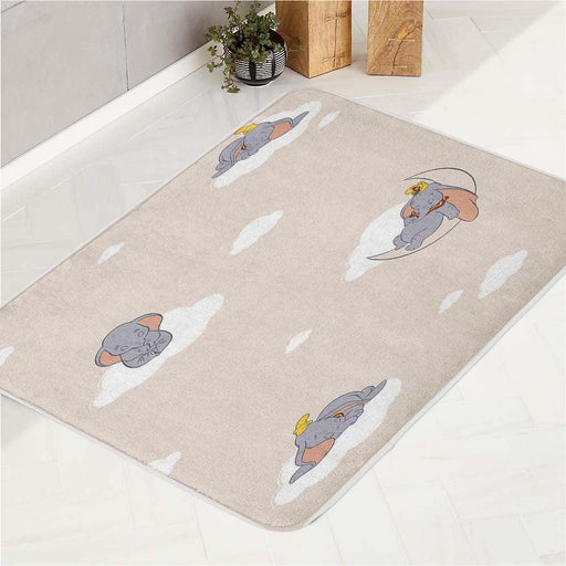 dumbo sleeping in the moon bath rugs