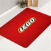 lego logo look like dots bath rugs