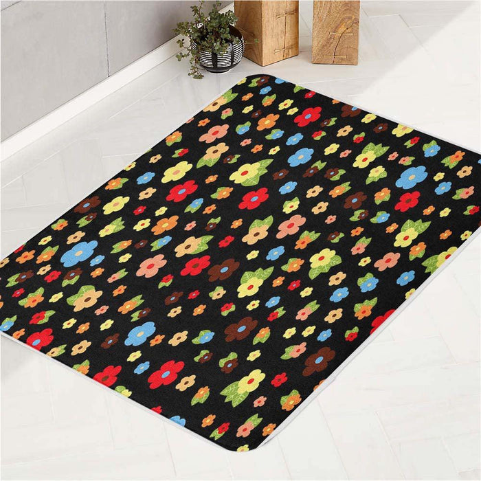 little beautiful flower in the dark bath rugs