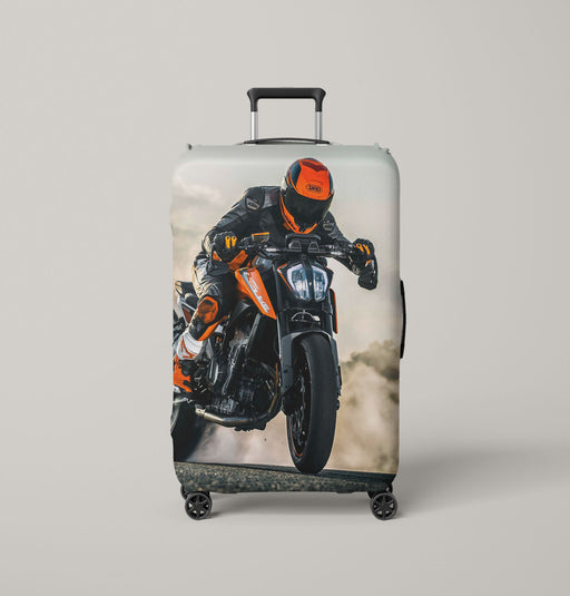 man riding  front of desert Luggage Covers | Suitcase