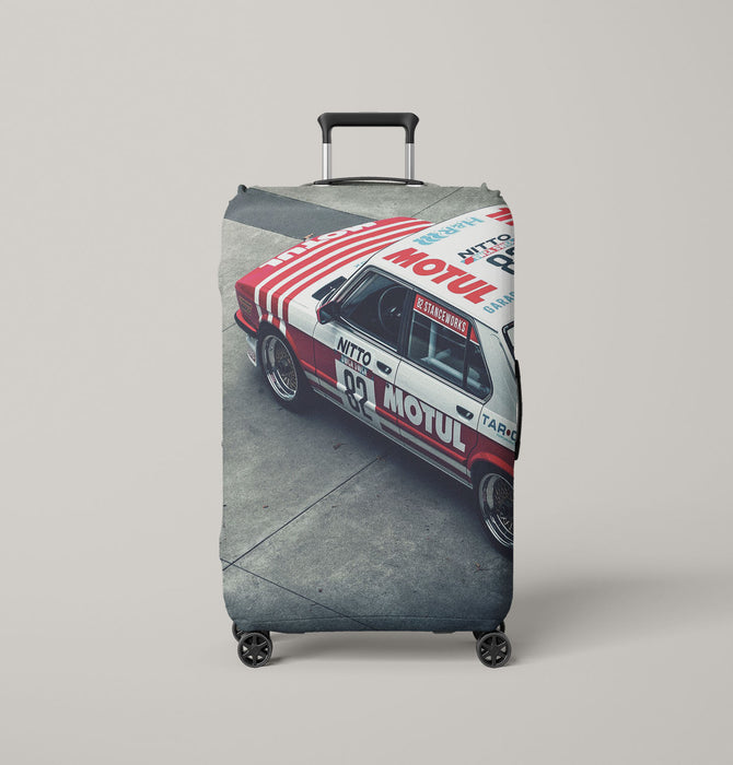 motul old car racing Luggage Covers | Suitcase