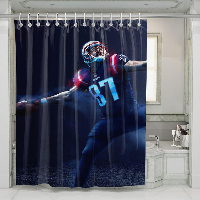 new england patriots player throwing shower curtains