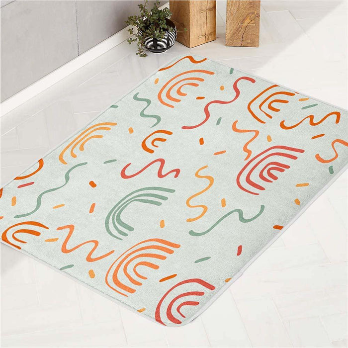 orange curves rainbow pattern bath rugs