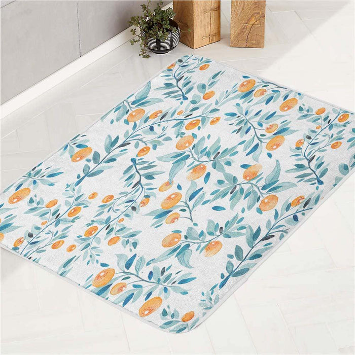 pattern of orange and leafs bath rugs