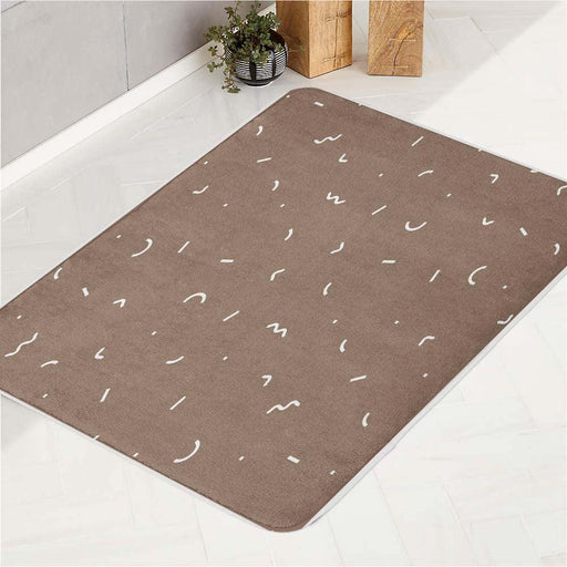 short brown curve lines bath rugs