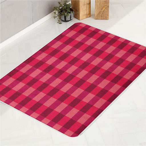 square pink cotton bath rugs