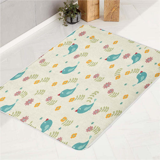 the blue bird with flower bath rugs