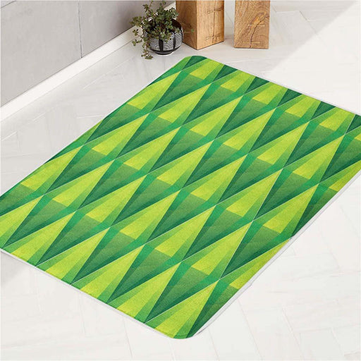 the sims iconic green crystal logo bath rugs